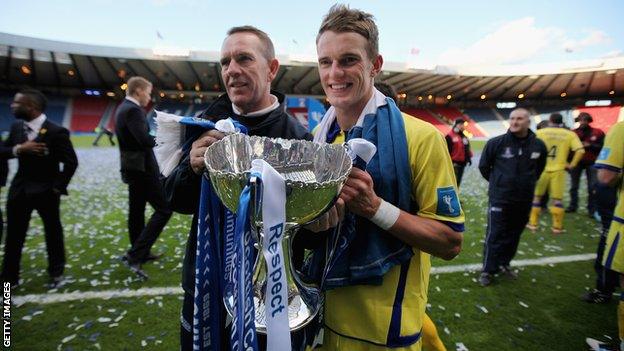 Shiels and son Dean after Kilmarnock's Scottish League Cup triumph over Celtic in March 2012