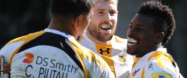 Wasps celebrate one of Christian Wade's six tries