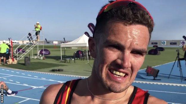 Alan Corlett speaking after winning the 10,000 metres event