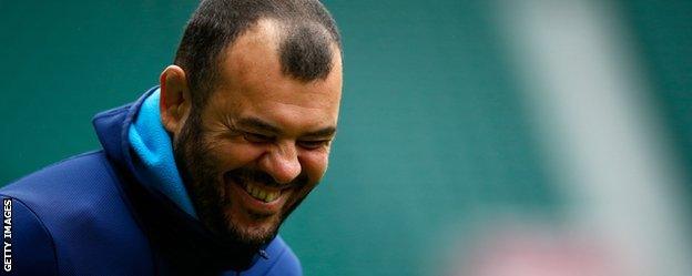 Australia coach Michael Cheika jokes during training