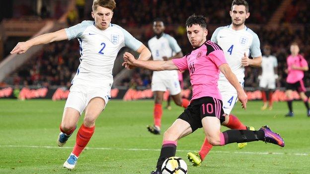 Lewis Mrgan in action v England U-21's