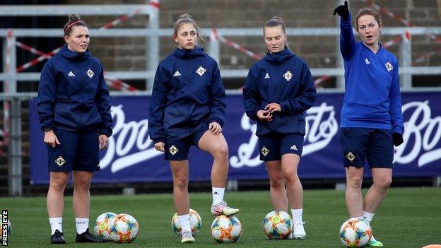 Marissa Callaghan (right) with Northern Ireland team-mates Emily Wilson, Abbie Magee and Kelsie Burrows