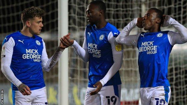 Peterborough celebrate scoring a goal