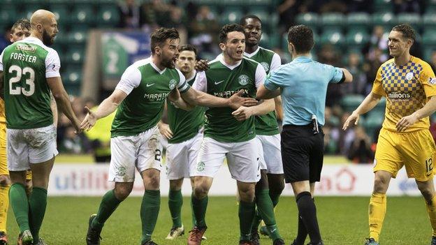 Darren McGregor (second from left) was sent off at Easter Road