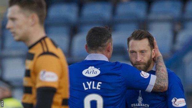Stephen Dobbie (right) celebrates for Queen of the South