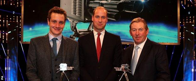 Alistair Brownlee, left, and Nick Skelton, right, celebrate coming second and third respectively with HRH The Duke of Cambridge