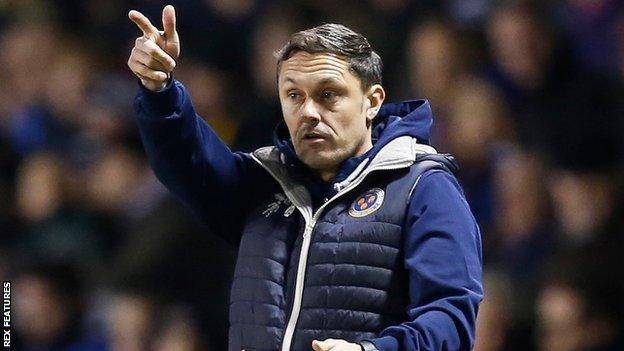 Shrewsbury boss Paul Hurst issues instructions on the touchline