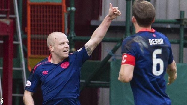 Steven Naismith celebrates a goal for Hearts