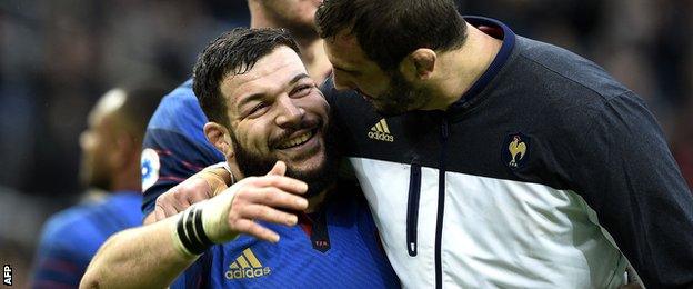 Rabah Slimani and Yoann Maestri celebrate France's win over Ireland