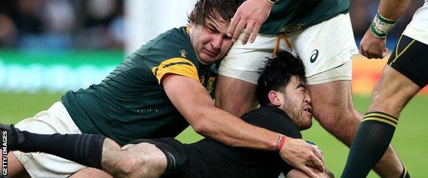 New Zealand's Nehe Milner-Skudder feels the force of the South Africa defence