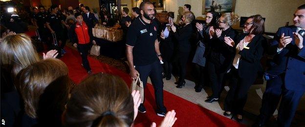 Japan leave their hotel in Brighton