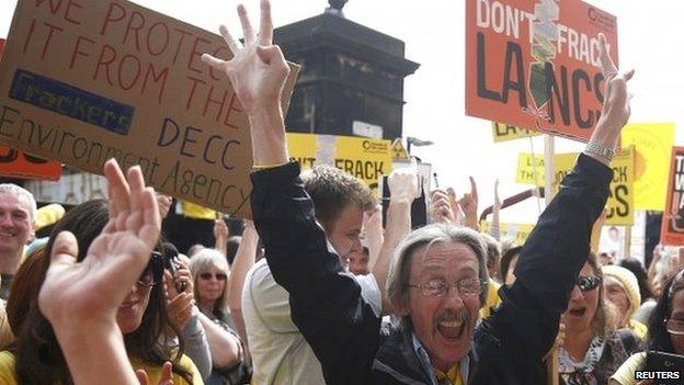 Anti-fracking protesters celebrate outside County Hall in Preston