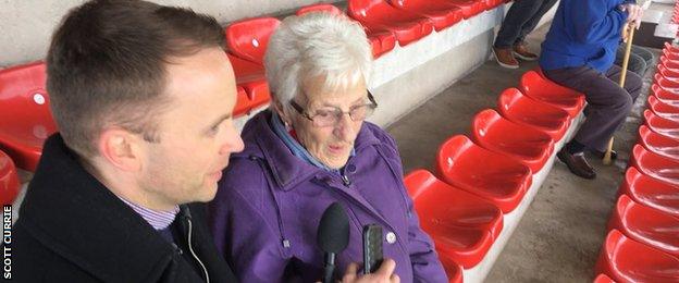 Jonathan Sutherland of BBC Scotland interviews Brechin City fan Margaret Noble at Glebe Park