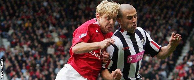 Neil Clement (right) tangles with Alan Smith at Old Trafford in May 2005