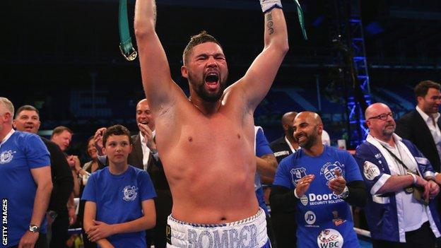 Tony Bellew celebrates winning the WBC cruiserweight title