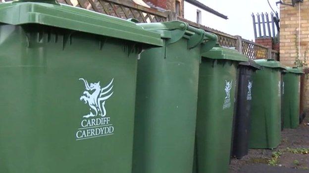 Garden waste bins outside block of flats