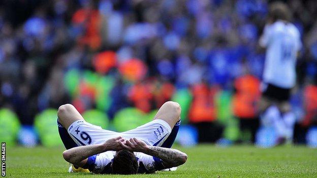 Liam Ridgewell collapses on the pitch after the Tottenham game in 2011