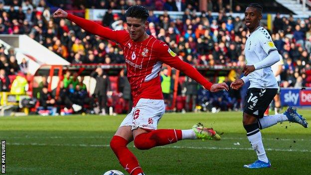 Ricky Aguiar playing for Swindon Town