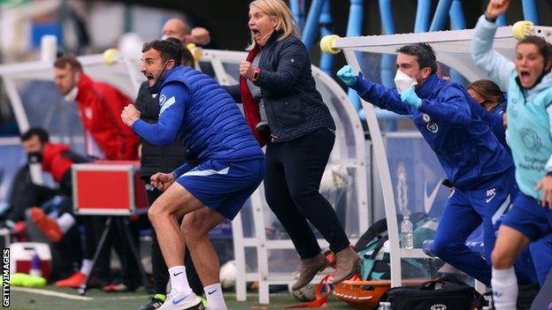 Emma Hayes and her coaching staff celebrate