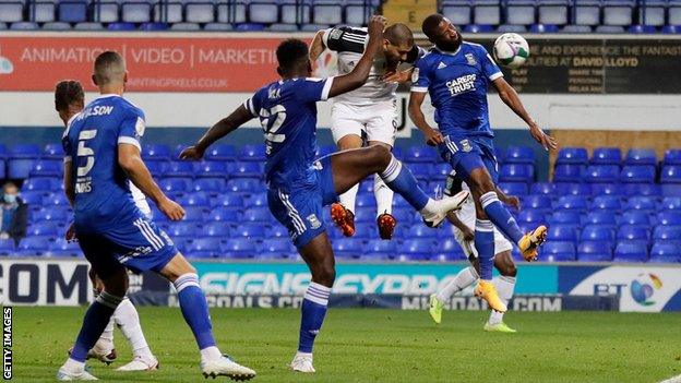 Aleksandar Mitrovic heads Fulham ahead against Ipswich