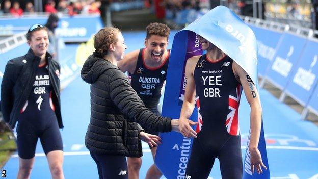 The British team hug on the finish line