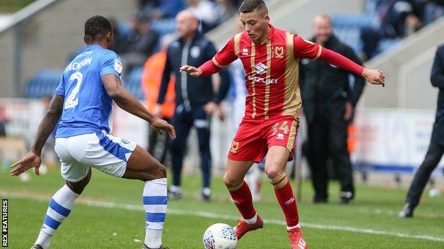 Stephen Walker in action in his previous loan spell at MK Dons in 2019