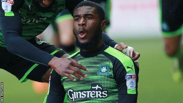 Moses Makasi celebrates after scoring for Plymouth Argyle