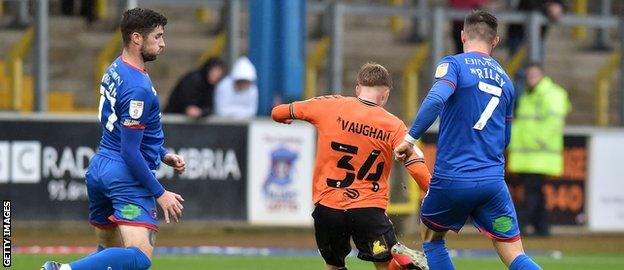 Corey Whelan and Joe Riley close down an Oldham player