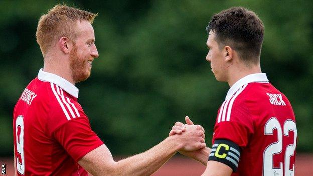 Adam Rooney (left) and Ryan Jack