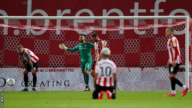 Brentford players look dejected