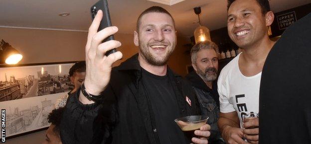 Finn Russell and former All Black Casey Laulala