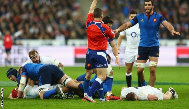 Dylan Hartley lies on the floor after the clash with Atonio