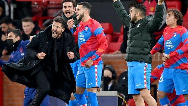 Diego Simeone and his Atletico Madrid players celebrate scoring against Manchester United