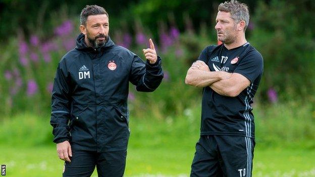 Aberdeen boss Derek McInnes (left) and Tony Docherty