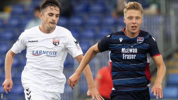 Jamie Lindsay (right) in action for Ross County against Graham Webster