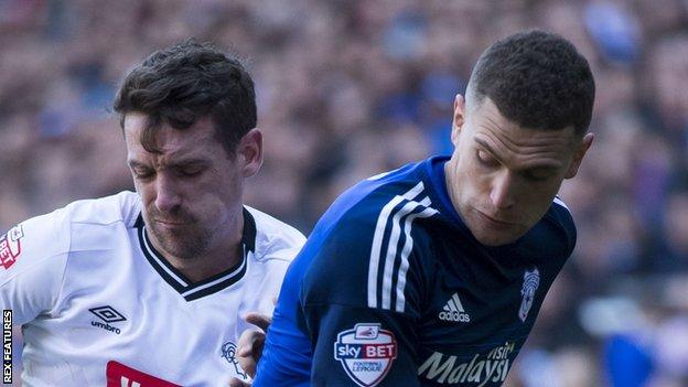 Craig Bryson and former Cardiff player Craig Noone