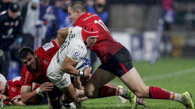 Sean Reidy (left) and Jacob Stockdale (right) attempt to prevent Toulouse's Cheslin Kolbe from scoring a try in the Heineken Champions Cup game last month