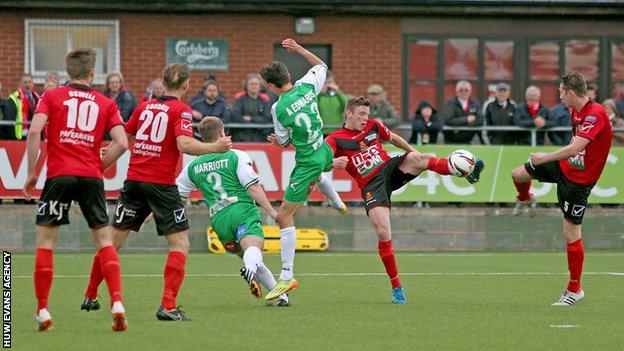 Newtown (in red) lost the Welsh Cup final to TNS but beat Aberystwyth in the play-off final for a place in Europe