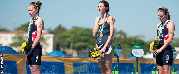 Non Stanford and Vicky Holland on the podium with Gwen Jorgensen