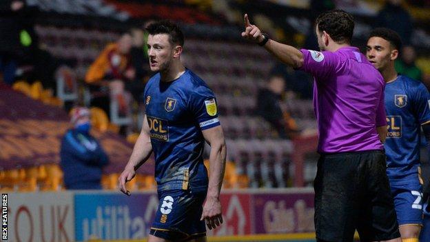 Mansfield Town's Ollie Clarke is sent off against Bradford City