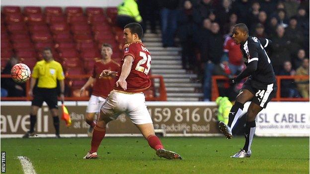 Odion Ighalo scores