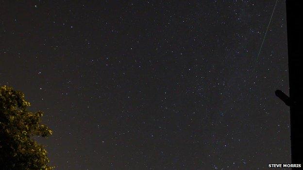 The Perseid meteor shower over a home in St Asaph, Denbighshire