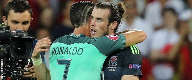 Portugal's Cristiano Ronaldo and Wales' Gareth Bale embrace