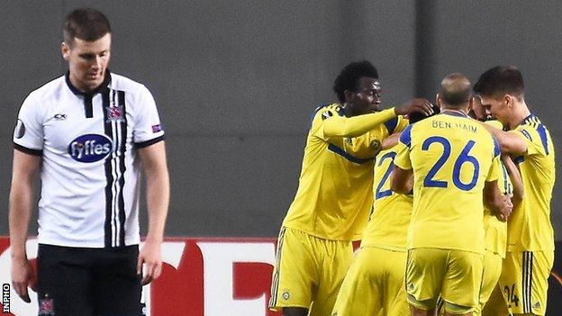 Dundalk's Patrick McEleneny is dejected after Dor Miha scored Maccabi's second goal