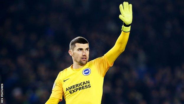 Brighton goalkeeper Mat Ryan waves to acknowledge the crowd after a draw against Arsenal