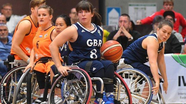 GB wheelchair basketball player Laurie Williams (centre)