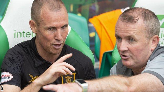 Kenny Miller and David Martindale discuss tactics on the Livingston bench