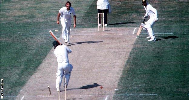 Ian Botham bowls Rod Marsh in Australia's second innings