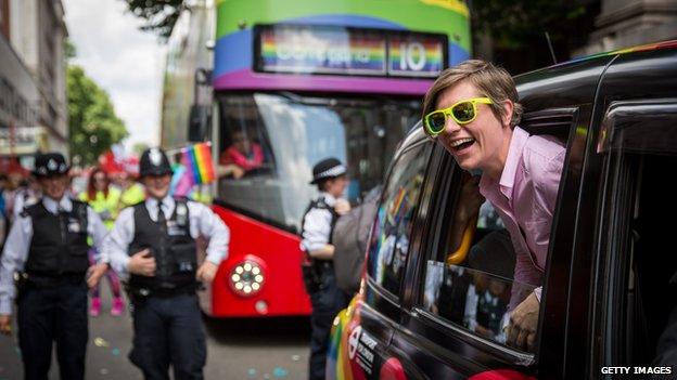 Members of the Lesbian, Gay, Bisexual and Transgender (LGBT) community take part in the Pride Parade in London