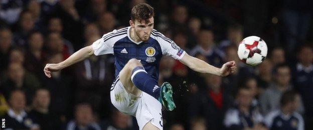 Scotland left-back Andy Robertson controls the ball against Lithuania